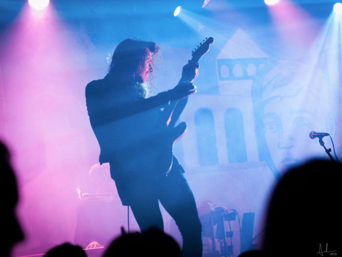 Concert photo – guitarist in stage light